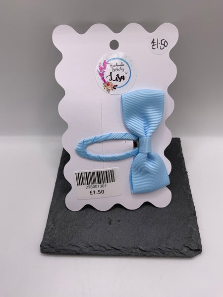 (228) Ribbon bow clip pale blue